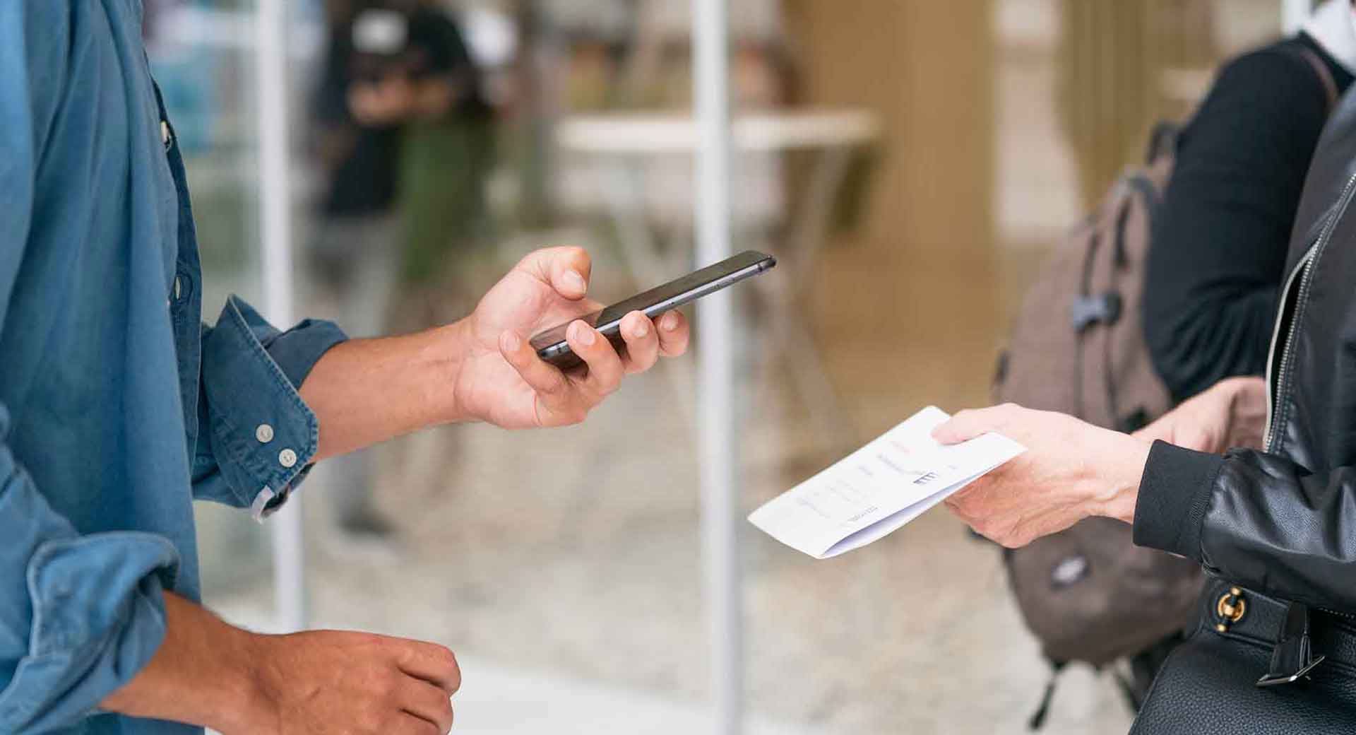 Man scans paper wallet to receive his tokens